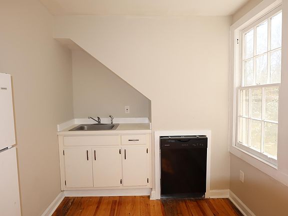 Kitchen sink and built in dishwasher.