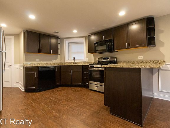 4th image of 3318-20 N Albany Ave #7780573