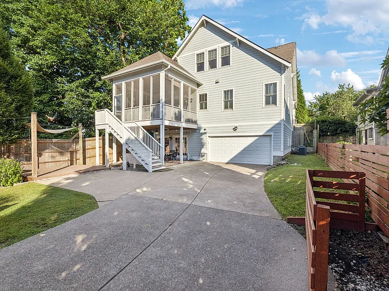 Beautiful family home, fully furnished, with hardwood floors and a garage.