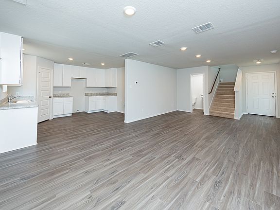Dining Area and Kitchen to Family Room