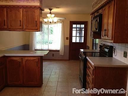 Kitchen
						:
						Recently updated kitchen with ceramic tile, new lighting updated appliances