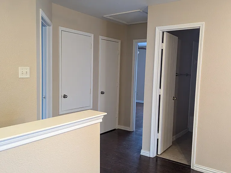 2nd floor looking into bedroom 2 and bedroom 3 and the full bath