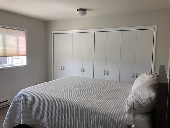 Bedroom with view and large closet