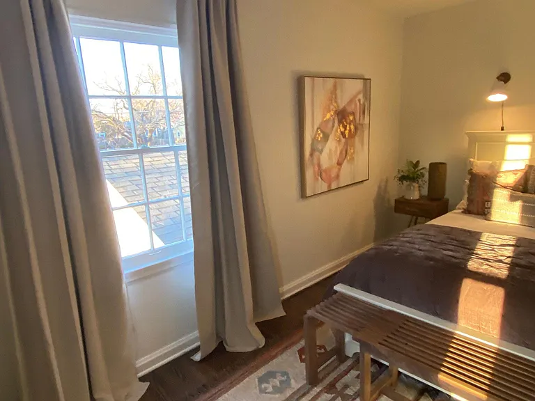 Large Bedroom with French doors to balcony