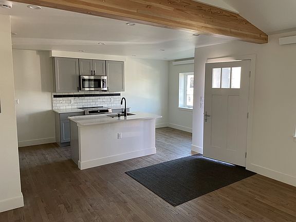 living area and kitchen/dining