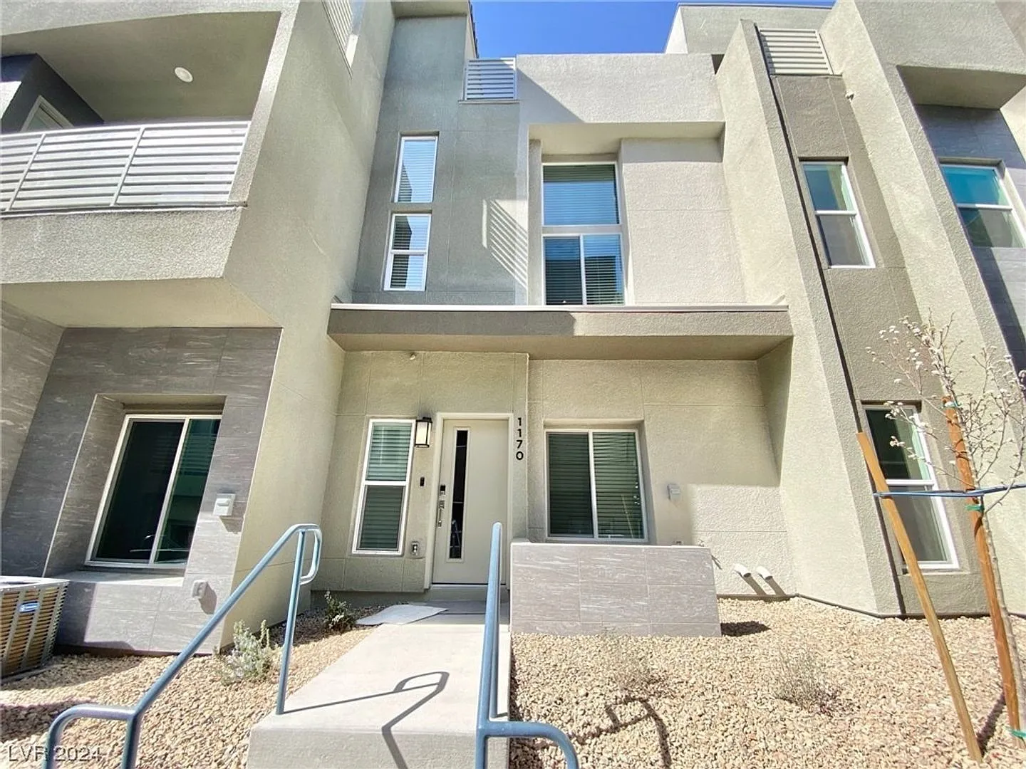 Elevated Living! Brand-New Townhome With Spectacular Rooftop Views — Photo 1