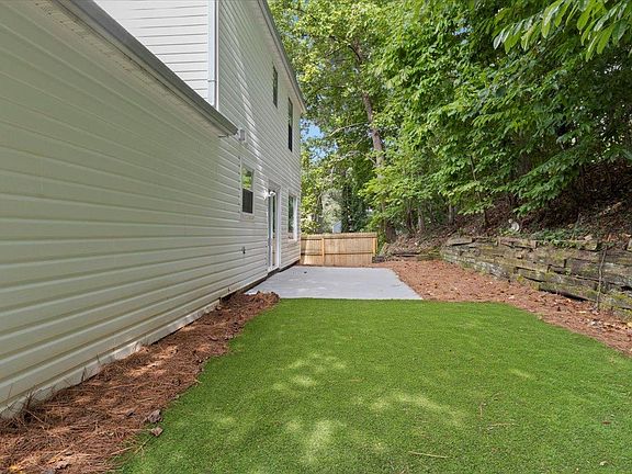 Turf backyard so you never need to mow it or water it. Just enjoy it.