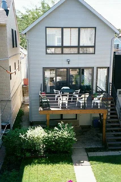 Coach house exterior deck, entry and yard
