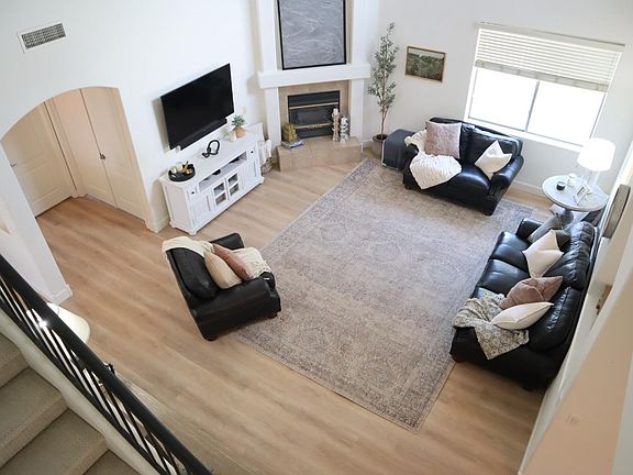 TOWERING vaulted ceilings create amazing openness. HUGE windows allow ample natural light.