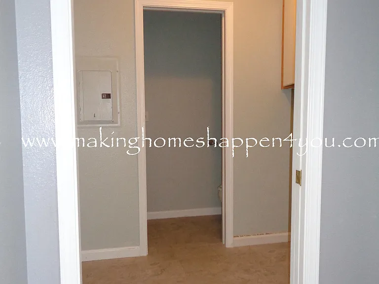 Entrance view point to Laundry room / Half Bathroom