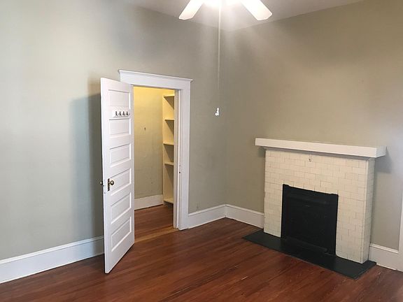 living room - large closet and fireplace