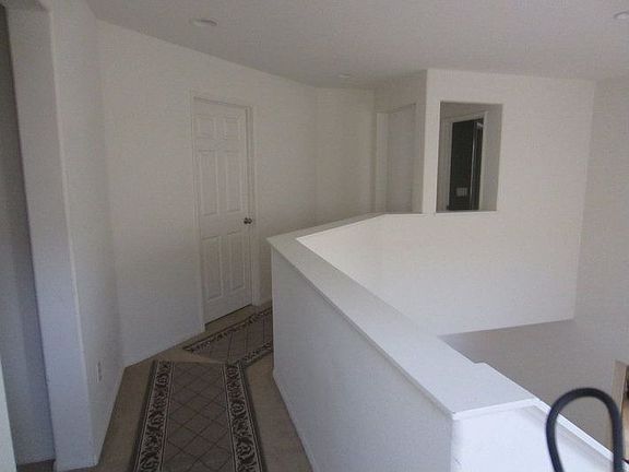 Hall Way To Other 2 Bedrooms