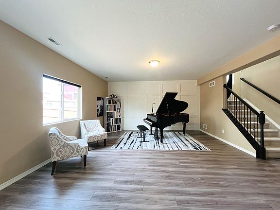 Custom board and batten wall treatment and LVP flooring