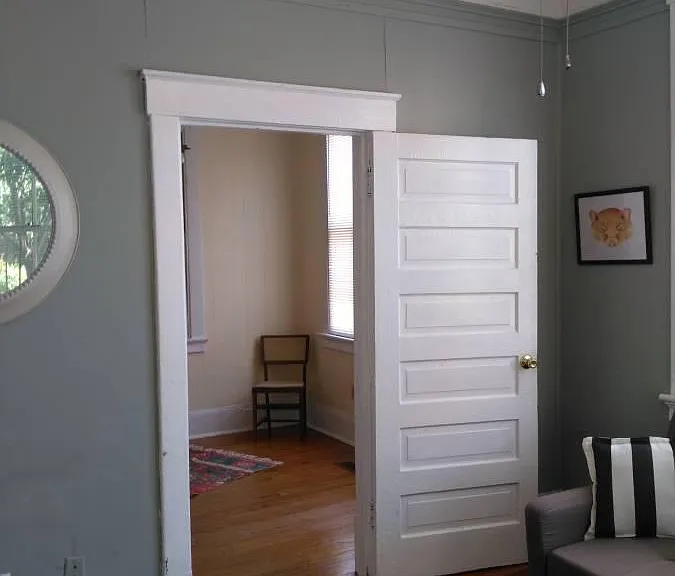 Light & airy corner room. Versatile floorplan of apartment allows this room to serve as the living room or as a bedroom.