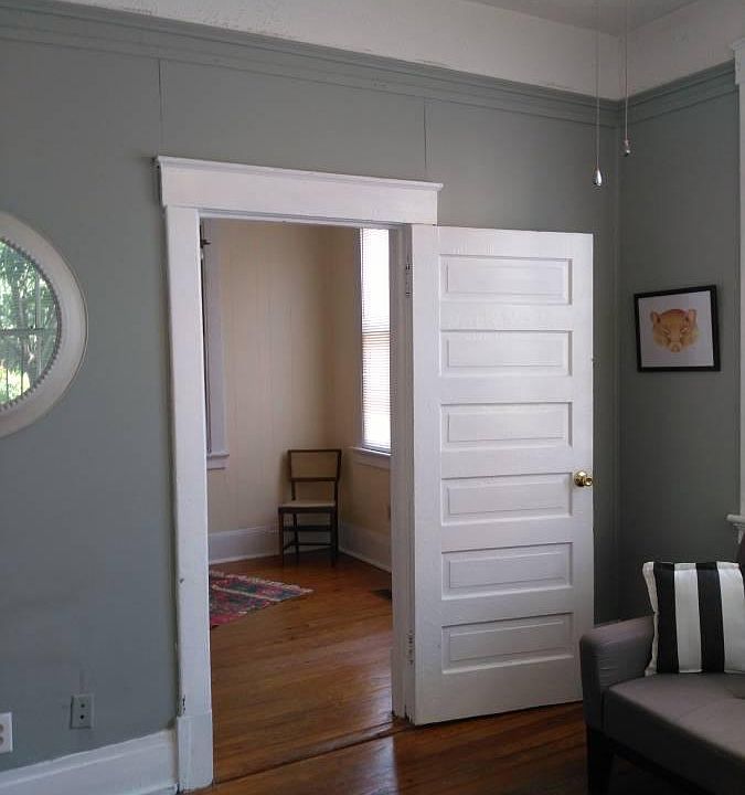 Light & airy corner room. Versatile floorplan of apartment allows this room to serve as the living room or as a bedroom.