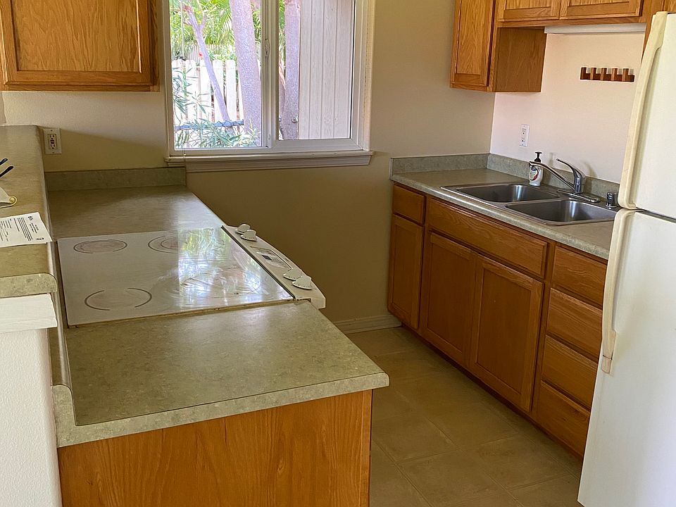 Kitchen open to living room and dining area