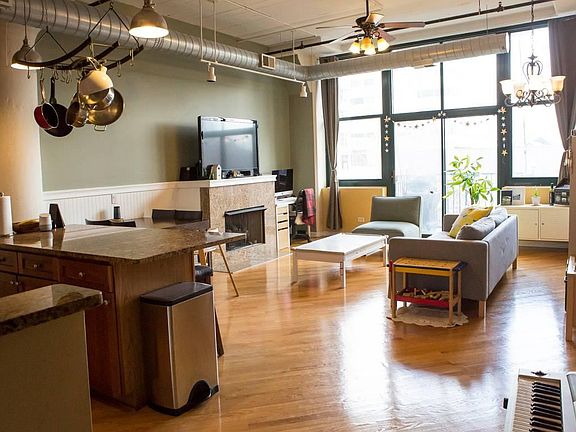 Living room with gas fireplace. See other photos for new light fixtures