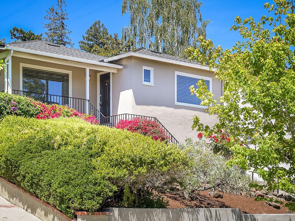 This charming home boasts a serene setting within blocks of Downtown San Carlos.