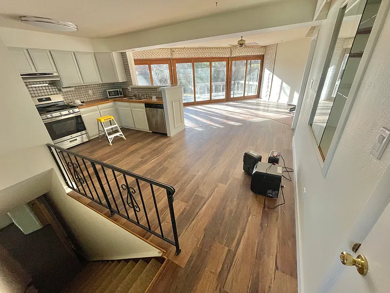 view from living room thru kitchen to back