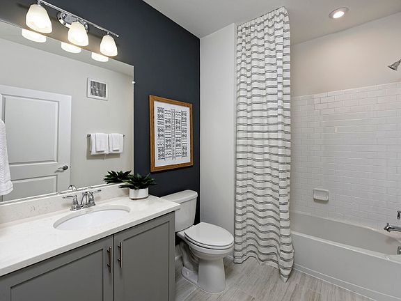 Hall Bathroom Situated Off of Foyer Near Guest Bedrooms