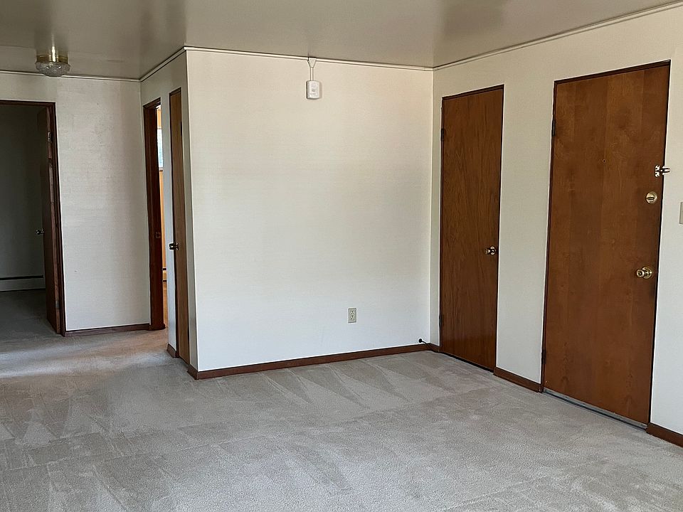 Double closet for costs, boots, etc in living room