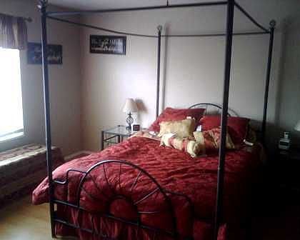 Master Bedroom with Wood Floors