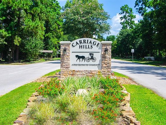 Welcome to Carriage Hills! Where the trees are plentiful, the shade is cool, the grass is greener, the quiet is broken only by the chirping of birds in the day time and crickets at night,and the only traffic is your neighbors.  A beautiful, meandering drive, through towering trees, will deliver you to this stunning stone and Hardy Plank, manor home.