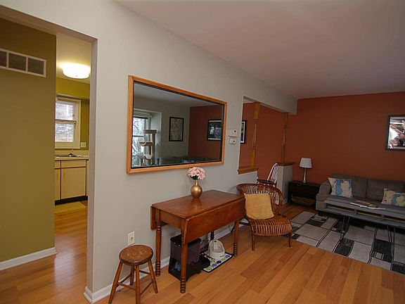 Inside front door looking at living room and kitchen