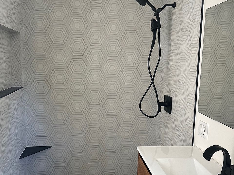 Double handheld shower head.