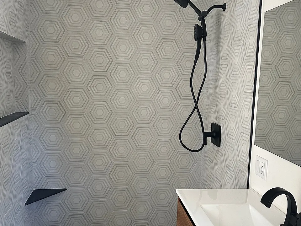 Double handheld shower head.
