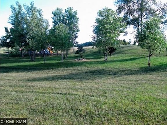 Back yard with shared fire pit.