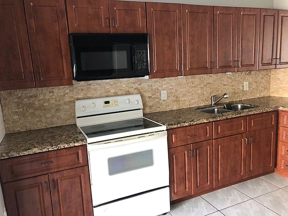 Kitchen area with granite counter tops