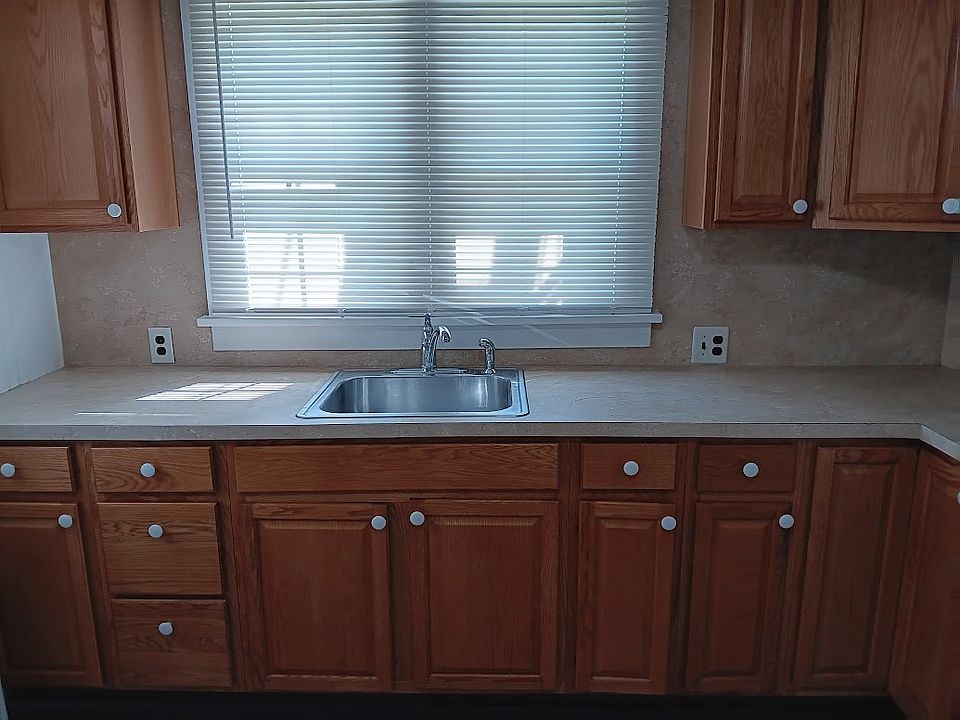 Eat-in Kitchen. Bright and airy Kitchen with lots of cabinet and closet storage space.