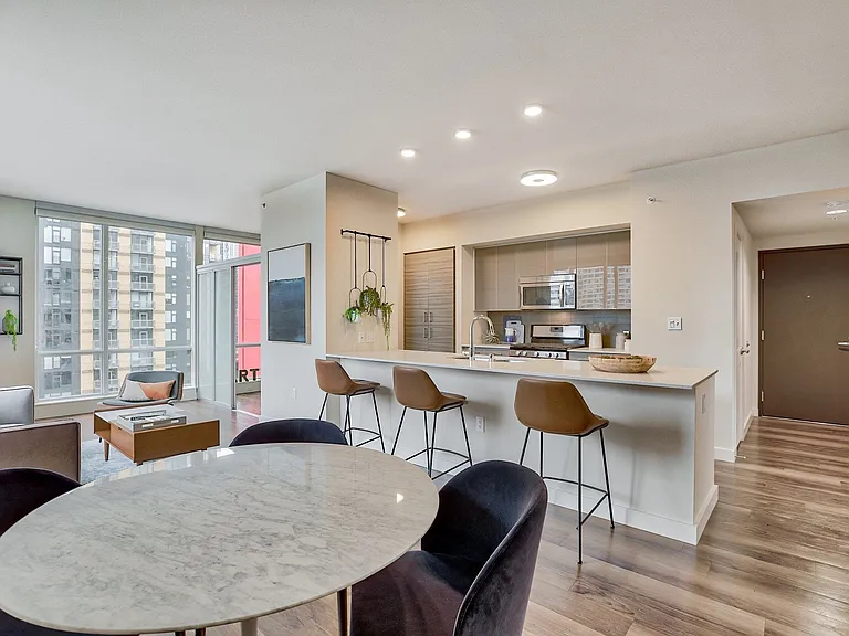 Cook, dine and entertain in an expansive kitchen equipped with luxury stainless steel appliances