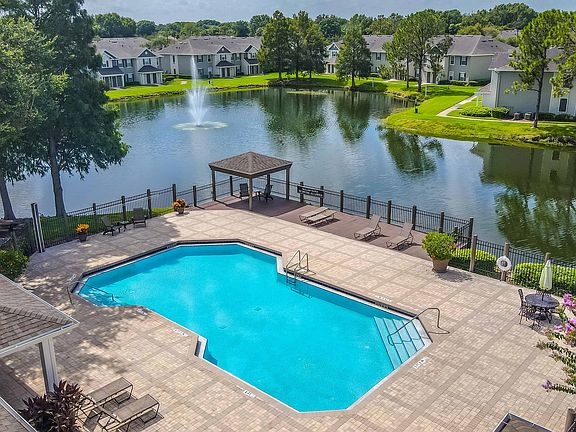 Beautiful and Tranquil Pool Area Overlooking the Pond and Fountain