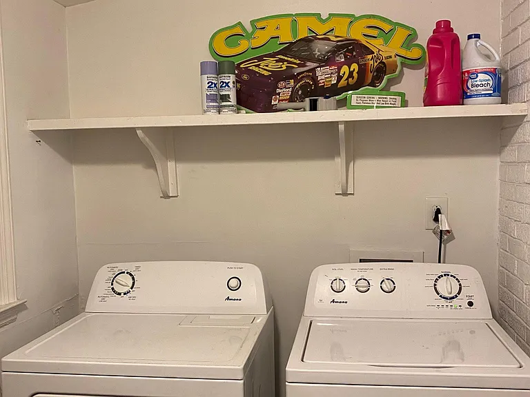 Private Laundry room with washer/dryer included for free. There's a large closet in the opposite wall.