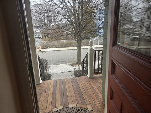 View of porch and street
