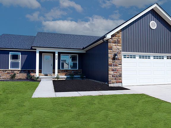 The Augusta by Todd Homes Elevation B with Vertical Board Batten