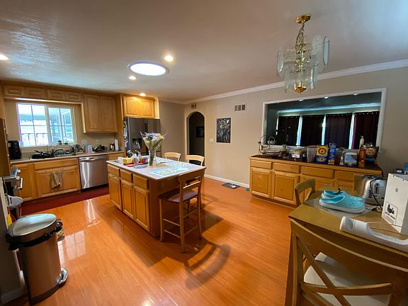 Kitchen with Island and another pub table.