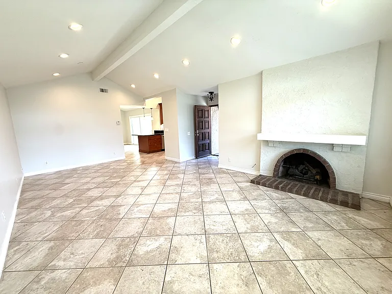 Living room with dining room area connected to living room.