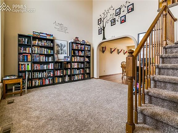 2 story formal living room with window bench.