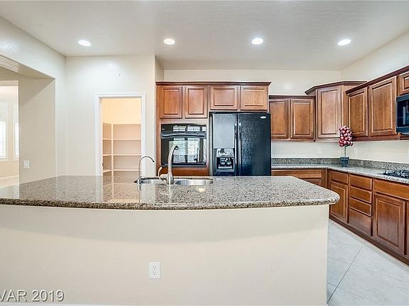 Huge kitchen island with counter-bar area for seating!