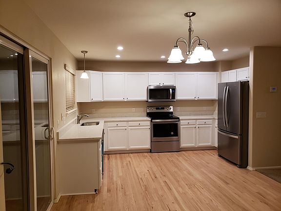 Brand new stainless steel kitchen appliances, cabinets and quartz counters, refinished hardwood floors, new farmhouse sink, light fixtures and fresh paint!