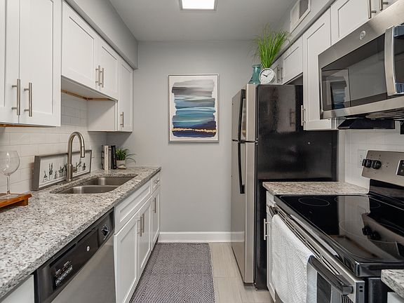 Kitchen with granite counters and stainless appliances