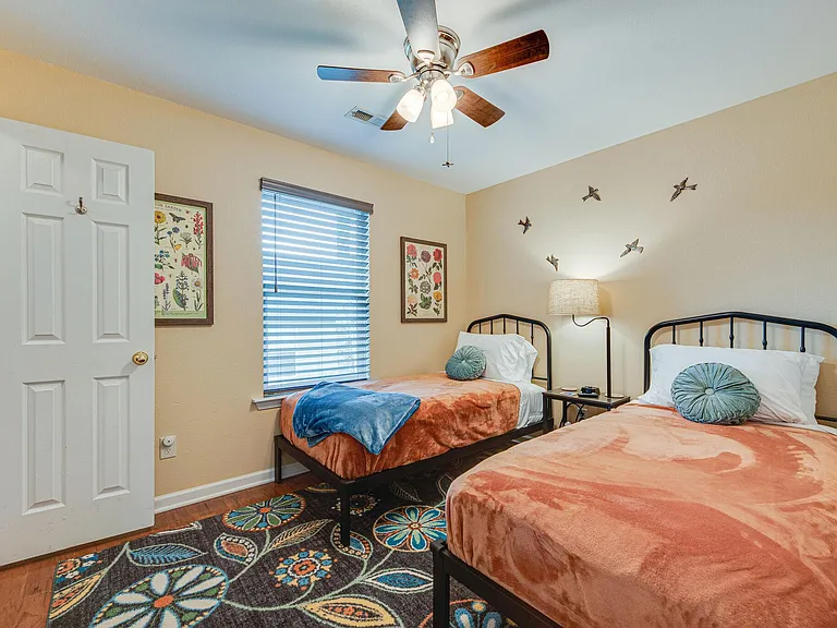 3rd bedroom has 2 plush twin beds, ceiling fan, walk-in closet and TV
