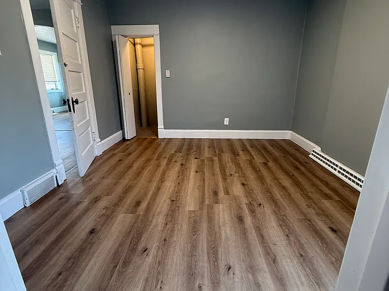 Back bedroom with small closet.