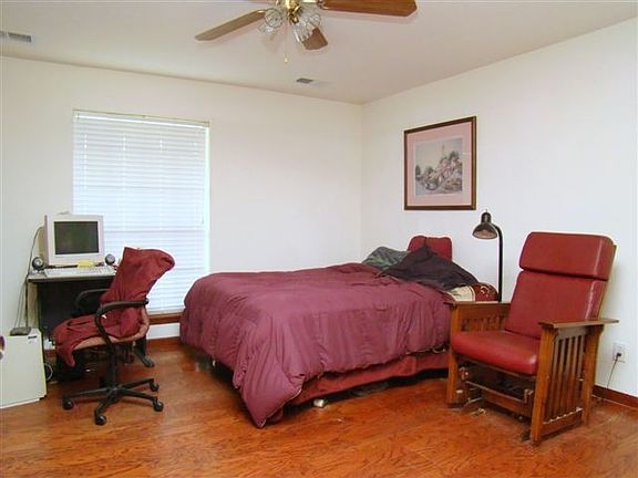 Master bedroom w/wood laminate floors!