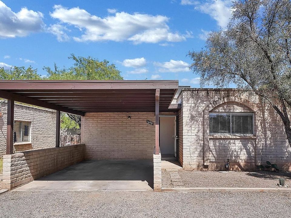 Covered carport and entry.
