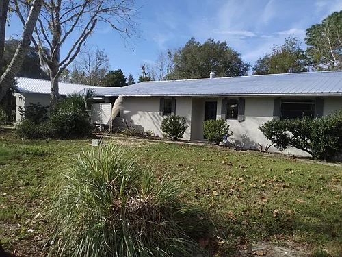 5564 W Woodlawn St Photo 1