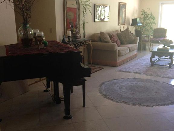 living room with marble floors